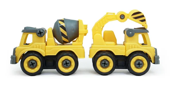 Gelbes Plastikspielzeug Von Betonmischer Und Baggerlaster Isoliert Auf Weißem Hintergrund — Stockfoto