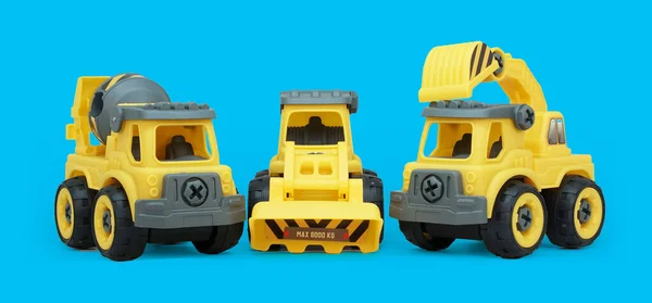 Geel Plastic Speelgoed Van Betonmixer Ecavator Truck Geïsoleerd Blauwe Achtergrond — Stockfoto