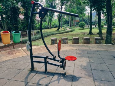 Pull chair at outdoor gym in Taman Lansia Park - Jagakarsa, Jakarta. Fresh Outdoor gymnastic workout equipment.