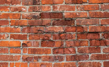 Dekorasyon için kısmen tahrip edilmiş kırmızı tuğlalı, desenli arka plan resmi