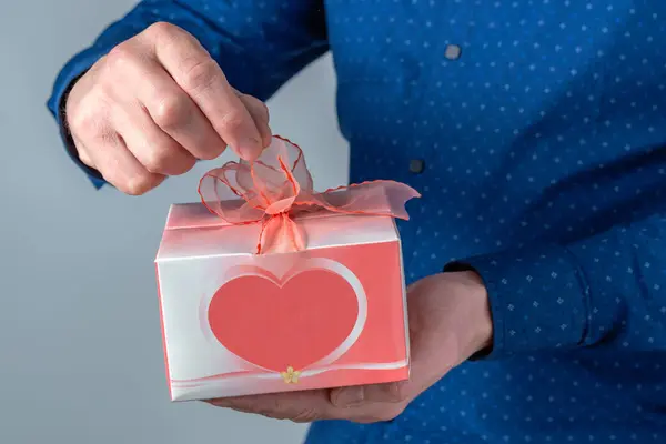 Valentine\'s Day gift in the hands of a man