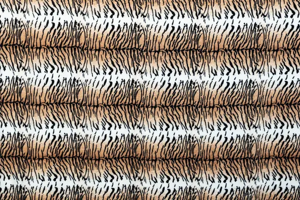 Arka plan olarak hayvan izi, kaplan etkisi. Kumaş deseni, arka plan deseni, kusursuz arka plan baskısı. Soyut yatay dikişsiz kumaş arkaplan ve dokusu.