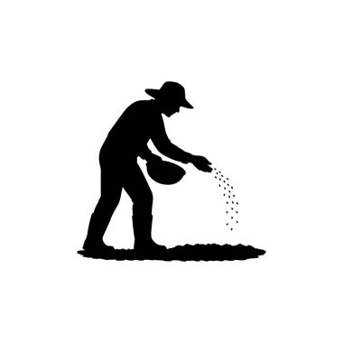 Beyaz arka planda izole edilmiş toprak siluetine tohum eken çiftçi