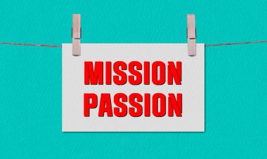 Mission to Passion Symbol. Concept words Mission to Passion on White Rectangle Paper Hanging on a Wooden Clothespin Green Background. Business Mission to Passion Concept with Copy Space clipart