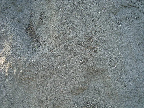Φόντο Από Μια Γκρίζα Άμμο Στην Παραλία — Φωτογραφία Αρχείου