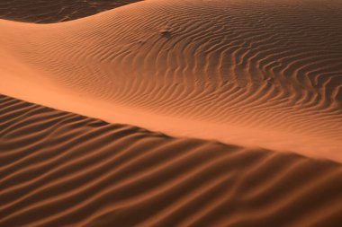 desert sand dunes in tadrart, algeria clipart