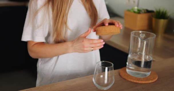 Faceless Girl Kitchen Open Jar Cork Cap Pour Water Glass Stock Footage