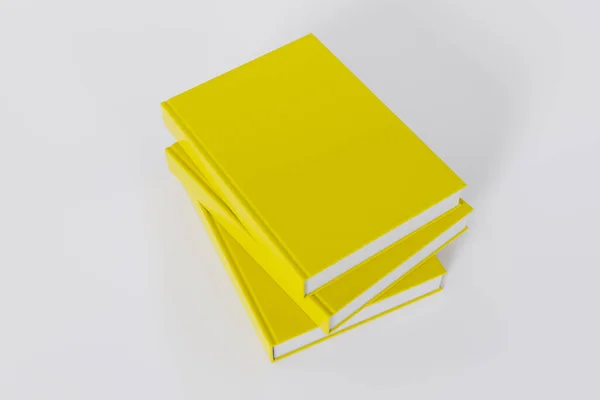 コピースペースで白い背景に隔離された閉じた黄色い本の山 — ストック写真