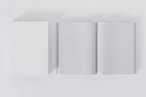 白い背景にコピースペースで隔離された開閉されたホワイトブック — ストック写真