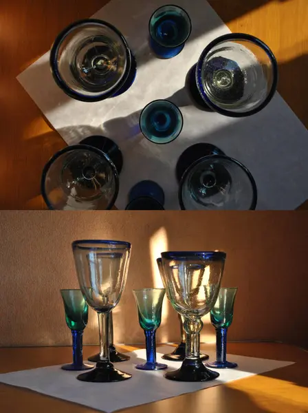 太阳光照射在桌上的老式玻璃杯 — 图库照片
