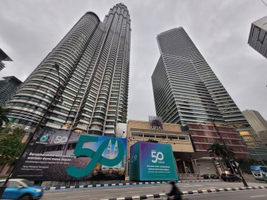 Twin Towers a popular tourist attraction in Kuala Lumpur city of Malaysia clipart