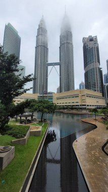 Twin Towers a popular tourist attraction in Kuala Lumpur city of Malaysia clipart