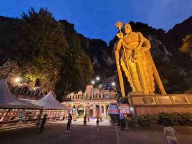 Batau caves Murugan Temple in Kaula Lumpur city of Malaysia is a popular tourist attraction, specially among Hindus all over world clipart