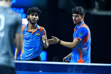 Chennai, Hindistan. 26 Mart 2025. Hintli çift Ankur Bhattacharjee ve Payas jain, İtalyan Carlo Rossi ve John Oyebode 'yi yenerek WTT yıldız yarışmacılarının birinci turunu kazandılar..