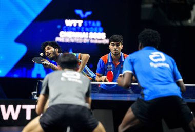 Chennai, Hindistan. 26 Mart 2025. Hintli çift Ankur Bhattacharjee ve Payas jain, İtalyan Carlo Rossi ve John Oyebode 'yi yenerek WTT yıldız yarışmacılarının birinci turunu kazandılar..