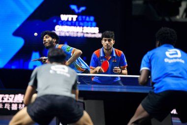 Chennai, Hindistan. 26 Mart 2025. Hintli çift Ankur Bhattacharjee ve Payas jain, İtalyan Carlo Rossi ve John Oyebode 'yi yenerek WTT yıldız yarışmacılarının birinci turunu kazandılar..