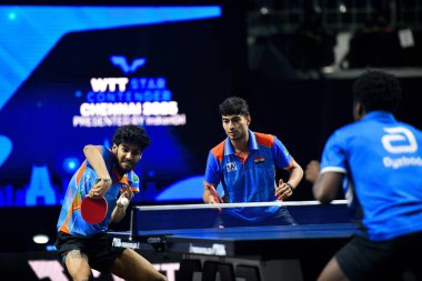 Chennai, Hindistan. 26 Mart 2025. Hintli çift Ankur Bhattacharjee ve Payas jain, İtalyan Carlo Rossi ve John Oyebode 'yi yenerek WTT yıldız yarışmacılarının birinci turunu kazandılar..