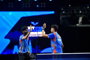 Chennai, Hindistan. 26 Mart 2025. Hintli çift Ankur Bhattacharjee ve Payas jain, İtalyan Carlo Rossi ve John Oyebode 'yi yenerek WTT yıldız yarışmacılarının birinci turunu kazandılar..