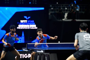 Chennai, Hindistan. 26 Mart 2025. Hintli çift Ankur Bhattacharjee ve Payas jain, İtalyan Carlo Rossi ve John Oyebode 'yi yenerek WTT yıldız yarışmacılarının birinci turunu kazandılar..