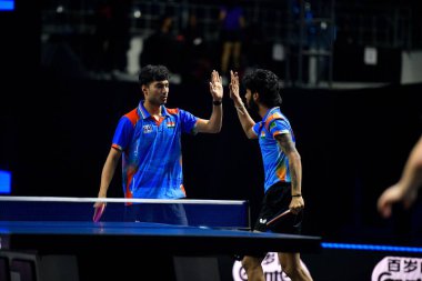 Chennai, Hindistan. 26 Mart 2025. Hintli çift Ankur Bhattacharjee ve Payas jain, İtalyan Carlo Rossi ve John Oyebode 'yi yenerek WTT yıldız yarışmacılarının birinci turunu kazandılar..