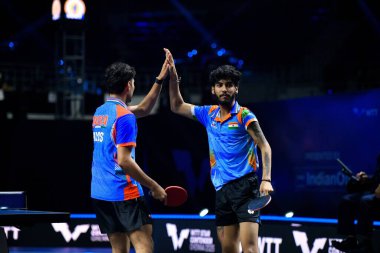 Chennai, Hindistan. 26 Mart 2025. Hintli çift Ankur Bhattacharjee ve Payas jain, İtalyan Carlo Rossi ve John Oyebode 'yi yenerek WTT yıldız yarışmacılarının birinci turunu kazandılar..