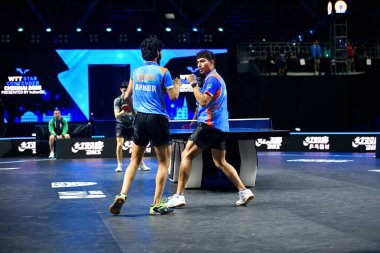 Chennai, Hindistan. 26 Mart 2025. Hintli çift Ankur Bhattacharjee ve Payas jain, İtalyan Carlo Rossi ve John Oyebode 'yi yenerek WTT yıldız yarışmacılarının birinci turunu kazandılar..