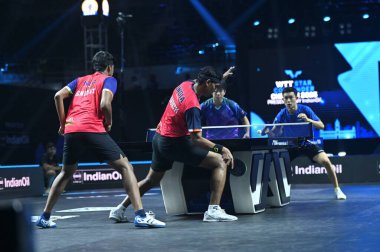 Chennai, Hindistan. 27 Mart 2025. Hintli çift Sharath Achanta ve Snehit Suravajjula, Avustralyalı çift Nicholas Lum ve Finn Luu 'yu yendi.