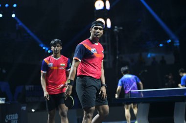 Chennai, Hindistan. 27 Mart 2025. Hintli çift Sharath Achanta ve Snehit Suravajjula, Avustralyalı çift Nicholas Lum ve Finn Luu 'yu yendi.