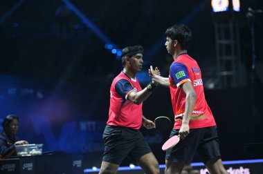 Chennai, Hindistan. 27 Mart 2025. Hintli çift Sharath Achanta ve Snehit Suravajjula, Avustralyalı çift Nicholas Lum ve Finn Luu 'yu yendi.