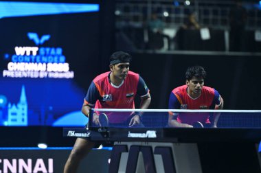 Chennai, Hindistan. 27 Mart 2025. Hintli çift Sharath Achanta ve Snehit Suravajjula, Avustralyalı çift Nicholas Lum ve Finn Luu 'yu yendi.