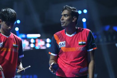 Chennai, Hindistan. 27 Mart 2025. Hintli çift Sharath Achanta ve Snehit Suravajjula, Avustralyalı çift Nicholas Lum ve Finn Luu 'yu yendi.