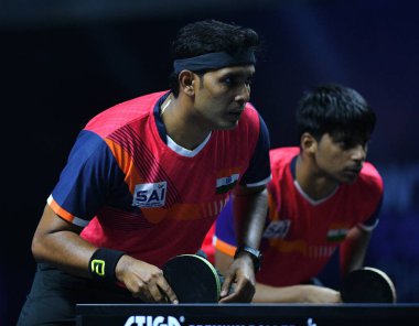 Chennai, Hindistan. 27 Mart 2025. Hintli çift Sharath Achanta ve Snehit Suravajjula, Avustralyalı çift Nicholas Lum ve Finn Luu 'yu yendi.