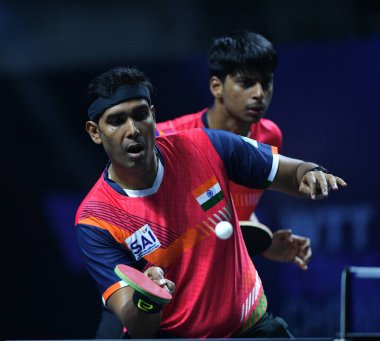 Chennai, Hindistan. 27 Mart 2025. Hintli çift Sharath Achanta ve Snehit Suravajjula, Avustralyalı çift Nicholas Lum ve Finn Luu 'yu yendi.