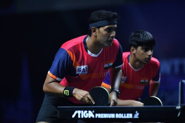 Chennai, Hindistan. 27 Mart 2025. Hintli çift Sharath Achanta ve Snehit Suravajjula, Avustralyalı çift Nicholas Lum ve Finn Luu 'yu yendi.