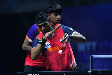 Chennai, Hindistan. 27 Mart 2025. Hintli çift Sharath Achanta ve Snehit Suravajjula, Avustralyalı çift Nicholas Lum ve Finn Luu 'yu yendi.