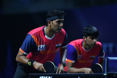 Chennai, Hindistan. 27 Mart 2025. Hintli çift Sharath Achanta ve Snehit Suravajjula, Avustralyalı çift Nicholas Lum ve Finn Luu 'yu yendi.