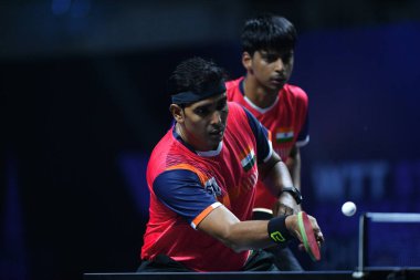 Chennai, Hindistan. 27 Mart 2025. Hintli çift Sharath Achanta ve Snehit Suravajjula, Avustralyalı çift Nicholas Lum ve Finn Luu 'yu yendi.