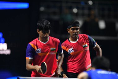 Chennai, Hindistan. 27 Mart 2025. Hintli çift Sharath Achanta ve Snehit Suravajjula, Avustralyalı çift Nicholas Lum ve Finn Luu 'yu yendi.