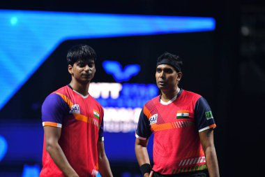 Chennai, Hindistan. 27 Mart 2025. Hintli çift Sharath Achanta ve Snehit Suravajjula, Avustralyalı çift Nicholas Lum ve Finn Luu 'yu yendi.