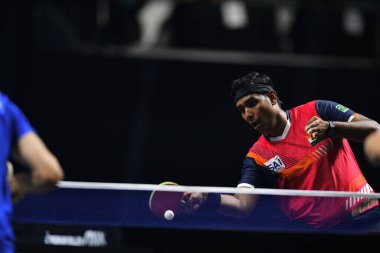 Chennai, Hindistan. 27 Mart 2025. Hintli çift Sharath Achanta ve Snehit Suravajjula, Avustralyalı çift Nicholas Lum ve Finn Luu 'yu yendi.