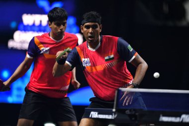 Chennai, Hindistan. 27 Mart 2025. Hintli çift Sharath Achanta ve Snehit Suravajjula, Avustralyalı çift Nicholas Lum ve Finn Luu 'yu yendi.