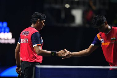 Chennai, Hindistan. 27 Mart 2025. Hintli çift Sharath Achanta ve Snehit Suravajjula, Avustralyalı çift Nicholas Lum ve Finn Luu 'yu yendi.