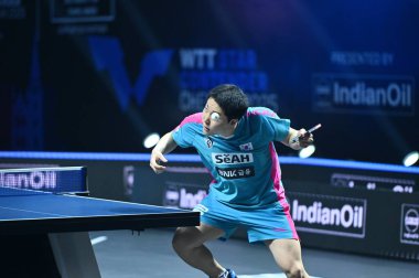 Chennai, Hindistan. 29 Mart 2025. Hintli oyuncu Manav Thakkar, Kore 'li oyuncu Lim Jonghoon' u erkekler tekler çeyrek finalinde yendi.