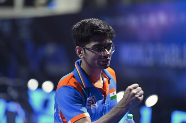 Chennai, Hindistan. 29 Mart 2025. Hintli oyuncu Manav Thakkar, Kore 'li oyuncu Lim Jonghoon' u erkekler tekler çeyrek finalinde yendi.