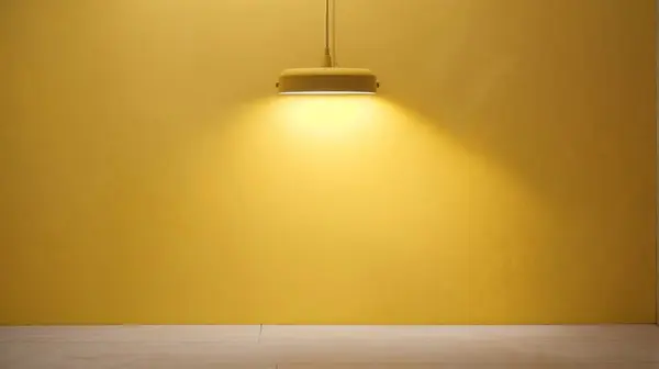 empty yellow room with lamp and yellow wall