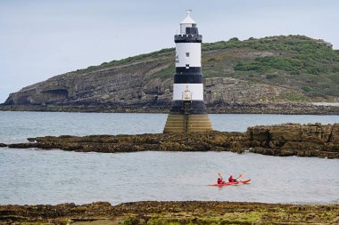 Penmon Point, Anglesey, Trwyn Du Lighthouse. Wales, United Kingdom. Black and white lighthouse. clipart