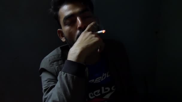 Person Man Smoking Cigarette Slow Motion Dark Room — Stock Video