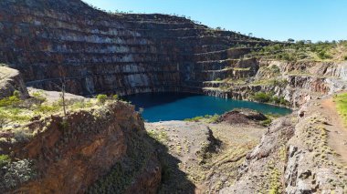 Aerial View of the Mary Kathleen Uranium Mine. The Mary Kathleen open-cut uranium mine, which operated between 1956 and 1963 and again between 1975 and 1982. It produced millions of tonnes of uranium ore, one of Australias oldest mines. clipart