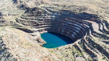 Aerial View of the Mary Kathleen Uranium Mine. The Mary Kathleen open-cut uranium mine, which operated between 1956 and 1963 and again between 1975 and 1982. It produced millions of tonnes of uranium ore, one of Australias oldest mines. clipart