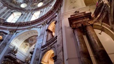 The Karlskirche Charles Church in the Karlsplatz in Vienna, Austria. Baroque Church Interior With Ornate Decor and Domed Ceiling Architecture